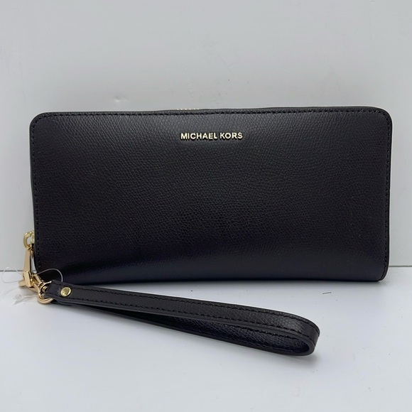 Michael Kors Handbags - Michael Kors JST Lg Leather Continental Wallet Wristlet Phone Holder 
Chocolate
